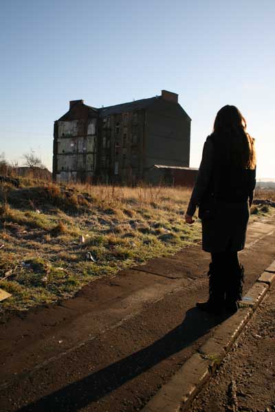 Karen looks at the last tenement standing
